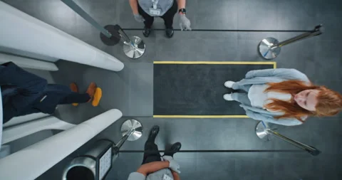 Airport Terminal: Queue of Diverse People, Travelers Walking Through X-ray Video stock 306796432