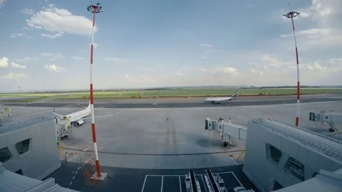 Airport. A timelapse during sunset Stock Footage 73684182