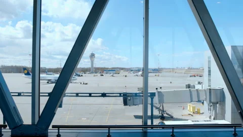In the Airport from the transition windows you can see the runway with airplanes Stock Footage 119555553
