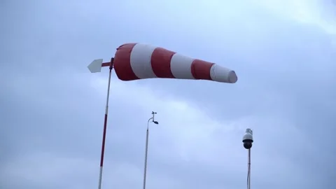 Airport wind cone with the cloud in the background, Stock Footage 255386822
