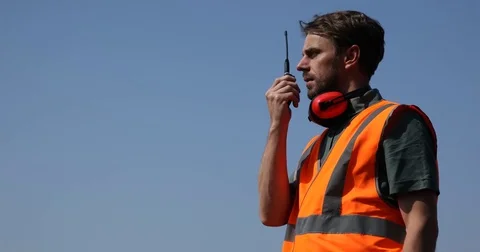 Airport Worker Man Communicating Over Walkie Talkie Telecommunication Equipment Stock Footage