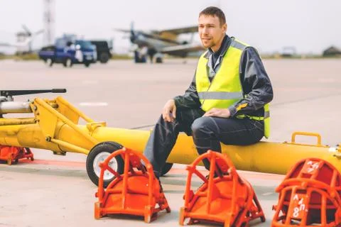 Airport worker support Stock Photos