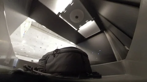 Airport X-Ray security scanner POV as suitcase enters rubber flaps Stock Footage 118208172
