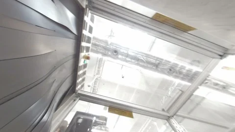 Airport X-Ray security scanner POV as camera emerges through rubber flaps Stock Footage 118253909