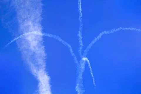 Airshow with planes in the cloudy sky Stock Photos