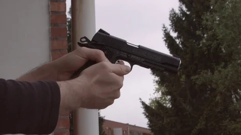 Airsoft gun with muzzleflash effect shooting outside Video stock 75941753