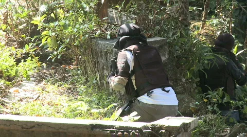 Airsoft Player Sneaking Up on Opponents Video stock 313251