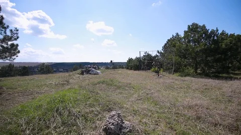Airsoft. Radar base in the pine forest. A copy of the radar. Afghan soldiers Stock Footage 128122626