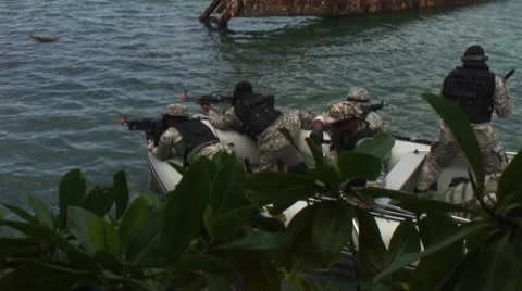 Airsoft tactical team training on a dingy on sea Stock-Footage 40331637