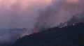 Airtanker spray against ferocious fire HD Footage
