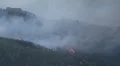 Airtankers spray against ferocious fire HD Footage