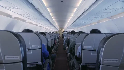the aisle pathway inside plane cabin wit... | Stock Video | Pond5