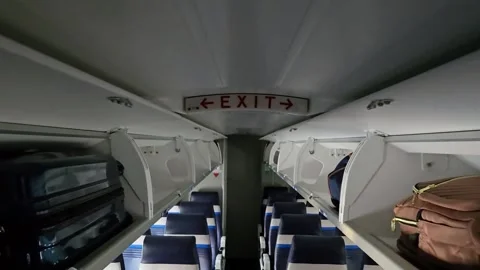 Aisle view inside aircraft cabin of a regional jet. Stock Footage 331273889