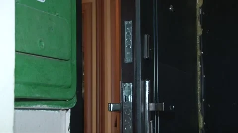 Ajar door to the apartment Stock Footage 55795680
