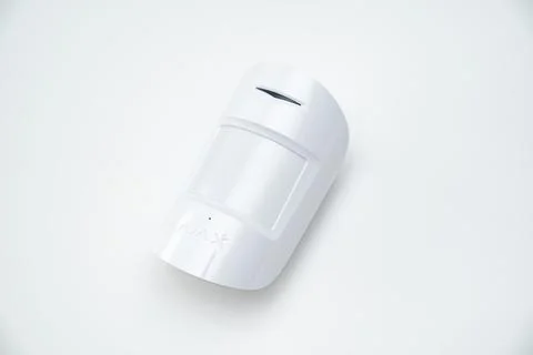 Ajax. motion sensor on white. device that tracks movement of objects. Stock Photos