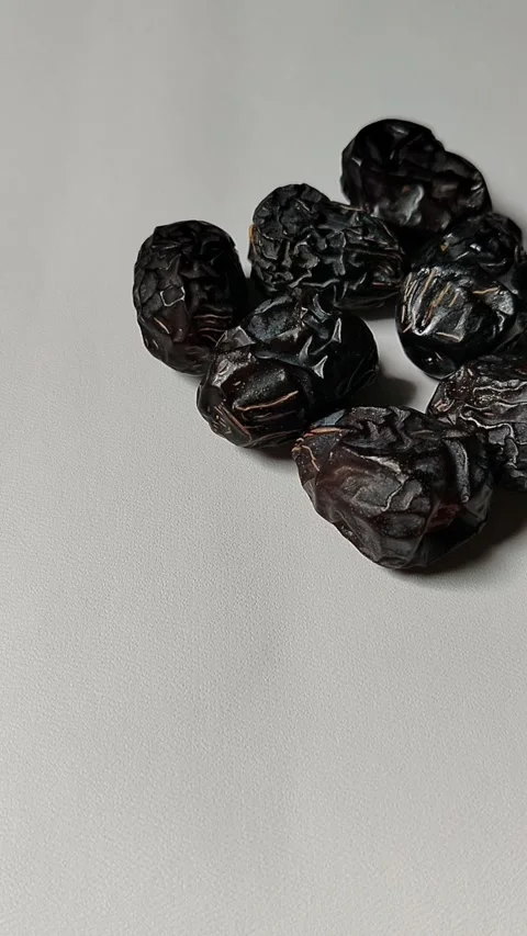 Ajwa dates, known as the Prophet's dates, are a premium type of date originating Stock Footage 330039311