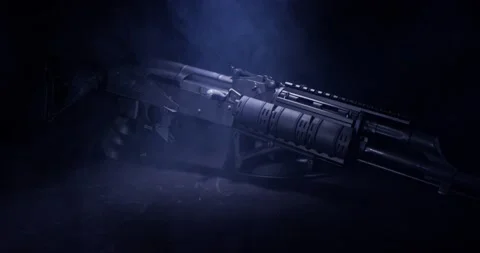 AK-47 Slow push in with haze machine while being in the dark. Stock Footage