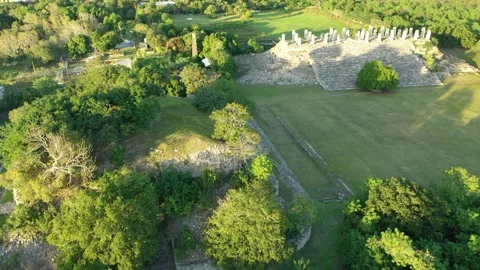 Ake Mayan Pyramid Drone Bacwards and tilting up, Yucatan, Mexico 2K  Stock Footage 154665402