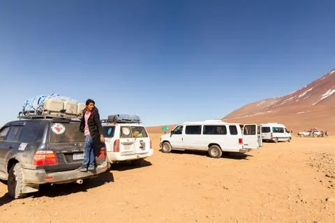 Aking a break during the off-road trip in the desert, in southern Bolivia Stock Photos