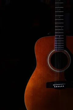 Akustische Gitarre auf schwarzem Hintergrund *** acoustic Guitar at black ... Stock Photos