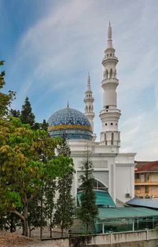 Al-Bukhari Foundation Mosque architecture with ornate blue dome and tall Stock Photos
