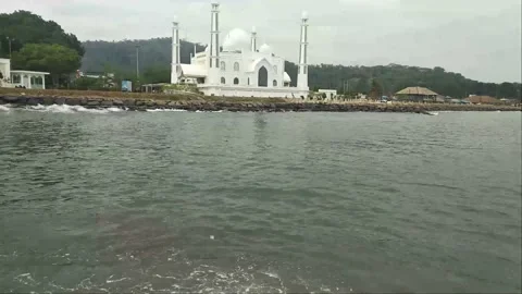 Al-Hakim Mosque beside the Beach. Al Hakim Mosque Padang with the dominant Stock Footage 201139093