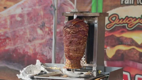 Al pastor meat on a spit Stock Footage 202143411