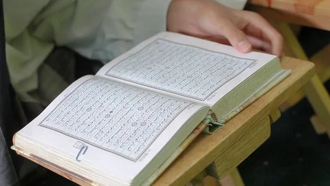 Al-Quran reading. Stock Footage 83992969