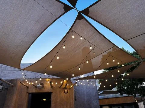 Al Seef Courtyard Canopy with String Lights. Dubai Old Town Evening Scene Stock Photos