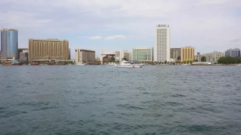 Al Seef Old Dubai Boating and Cruising in Canal Water with Buildings View Video stock 241674665