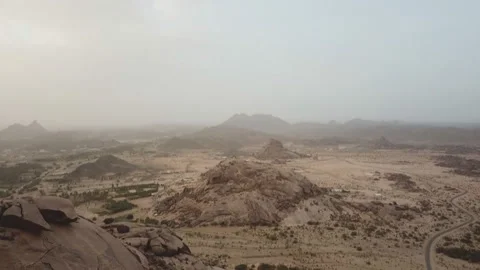 Al-Ula, Saudi Arabia. Overlooking the mountain valley landscale, and oasis Video stock 106800194