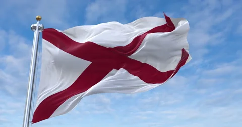 Alabama flag with flagpole waving in rolling clouds looping, 4K Perfect Loop 库存影片 280478521