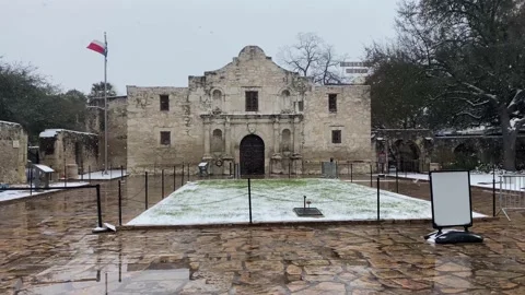 The Alamo in winter on a snowy day Stock Footage 148892353