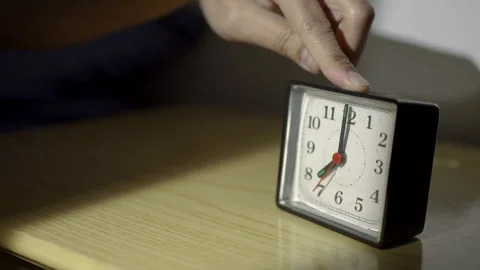 Alarm clock after waking up in bed Vidéo 265102398