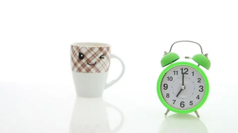 Alarm clock and cup Stock Footage 67646299