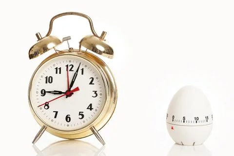Alarm clock and kitchen timer Stock Photos