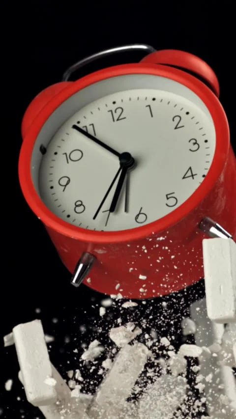 Alarm clock and school crayons fly up on a black background. Filmed on a high Stock Footage 335373503