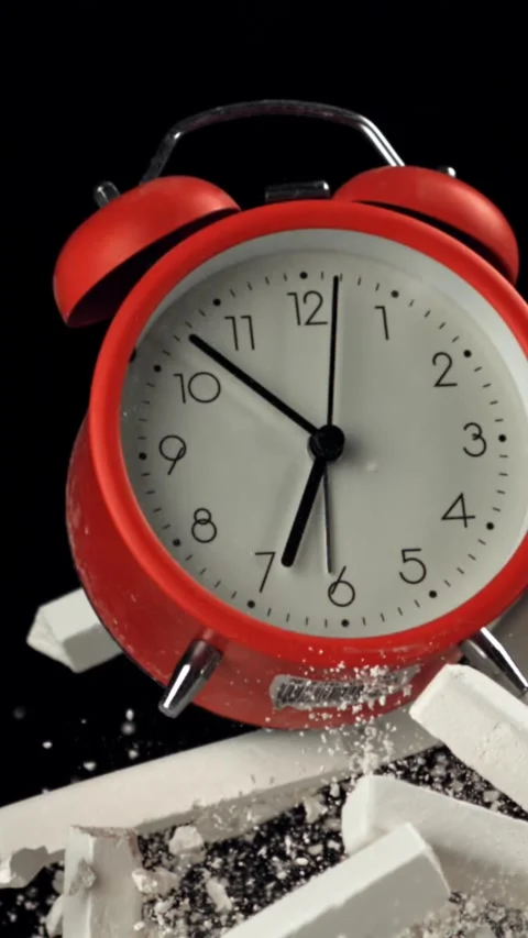 Alarm clock and school crayons fly up on a black background. Filmed on a high Stock Footage 335373564