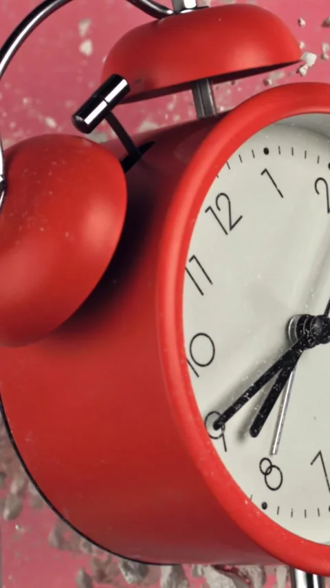 Alarm clock and school crayons fly up on a black background. Filmed on a high Stock Footage 335380699