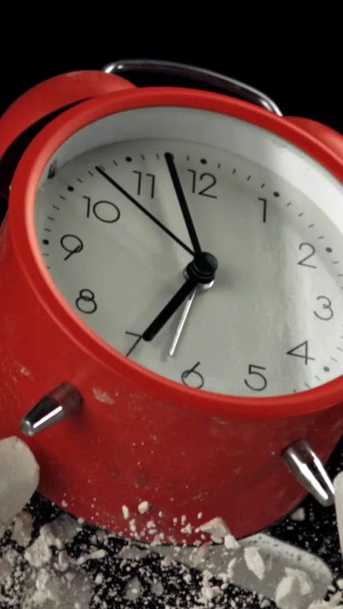 Alarm clock and school crayons fly up on a black background. Filmed on a high Stock Footage 335380886
