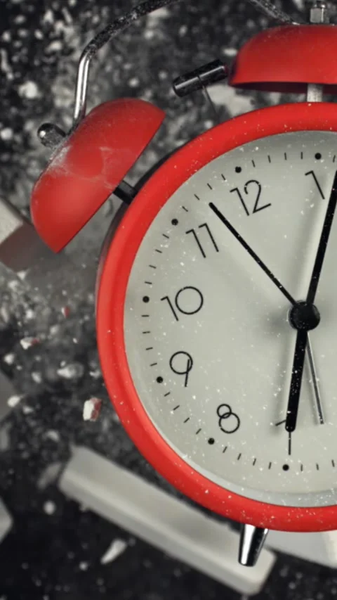 Alarm clock and school crayons fly up on a black background. Filmed on a high Stock Footage 335380999