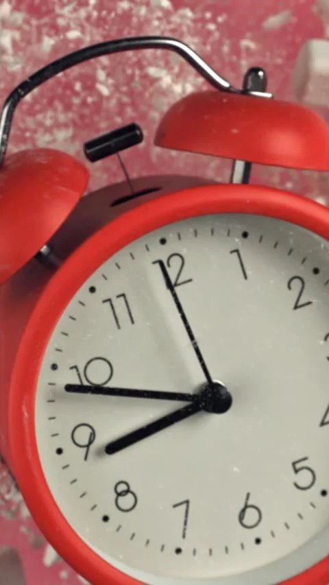 Alarm clock and school crayons fly up on a black background. Filmed on a high Stock Footage 335385473