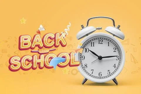 Alarm clock with back to school text on yellow background with decorative ele Stock Photos