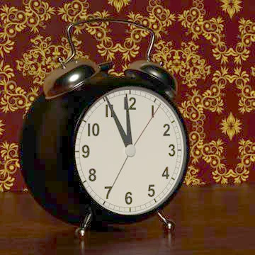 Alarm clock on bedside table. 3D rendering Illustrazione stock