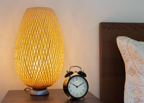 Alarm clock on the bedside table Foto stock