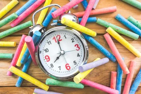 Alarm clock with chalk Stock Photos