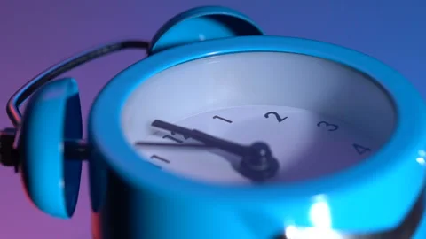 Alarm clock on a colored background Stock Footage 120728632