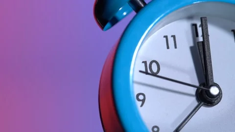 Alarm clock on a colored background Видео 120728766