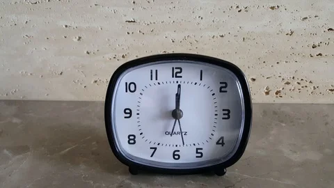Alarm clock fast forward with five minutes after twelve. Video stock 95937775