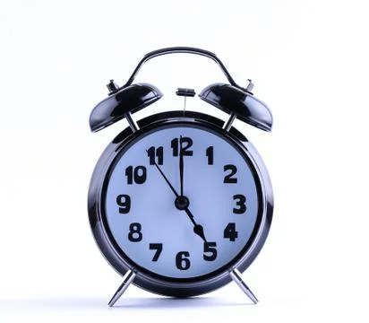 Alarm clock  with five o'clock Stock Photos